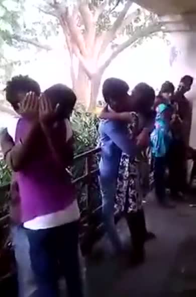 College couples enjoying a romantic kiss at the lovers point